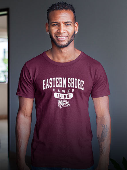 A black guy is wearing University of Maryland Eastern Shore Hawks Alumni T-shirt