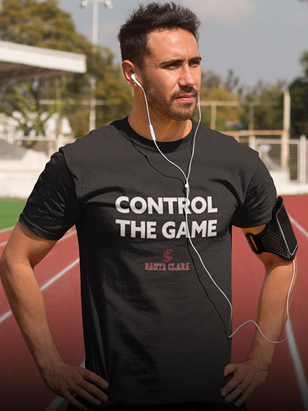 A man is wearing a Northeastern University Huskies t-shirt of ctg design