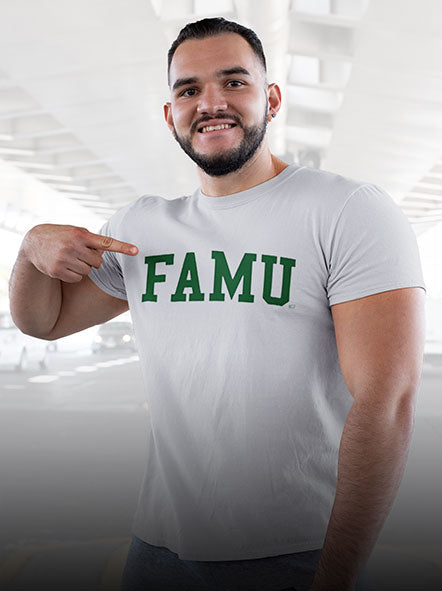 A muscular man is wearing FAMU t-shirt of game day design