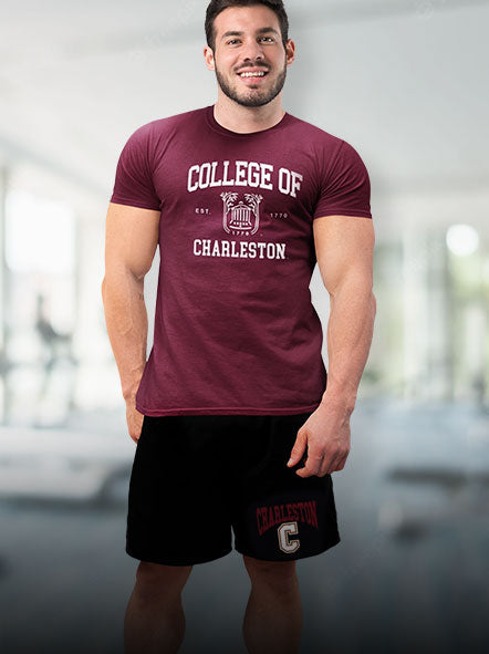 A muscular man is wearing College of Charleston Cougars t-shirt and shorts of premium design