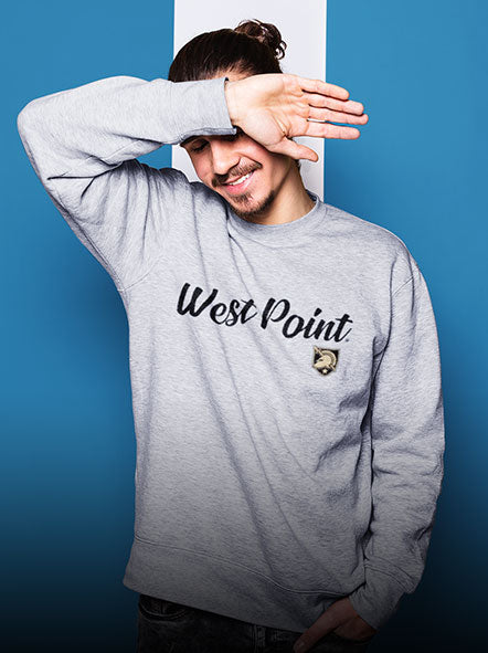 A guy is wearing west point sweatshirt of script design