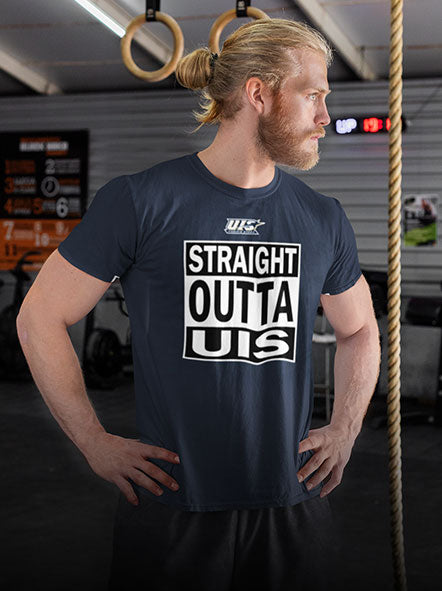 A muscular man is wearing a Straight Outta University of Illinois t-shirt of straight outta design