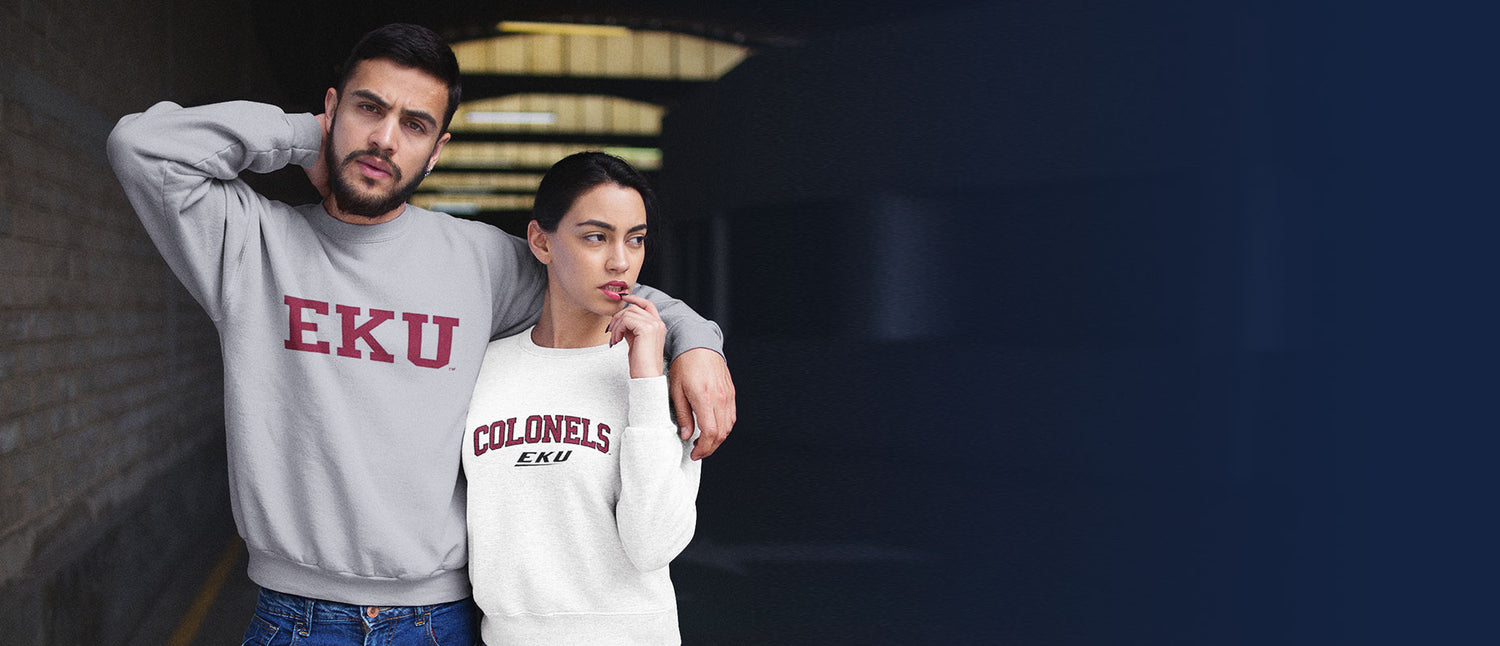 A guy and girl wearing an Eastern Kentucky University sweatshirt