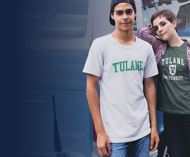 A college boy and girl wearing Tulane t-shirts