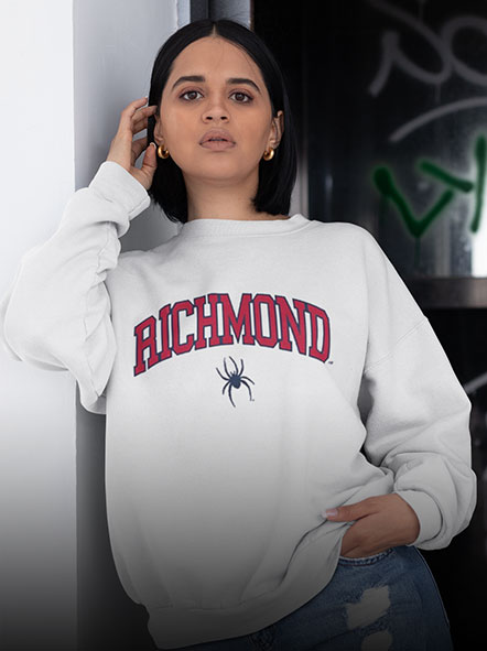 A girl is wearing a richmond sweatshirt of campus design