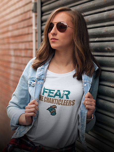 A girl is wearing a Coastal Carolina University Chanticleers t-shirt of  fear design