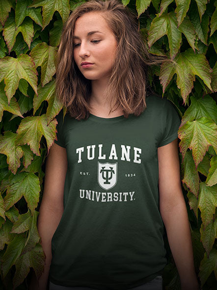 A girl is wearing TULANE university t-shirt of Seal design